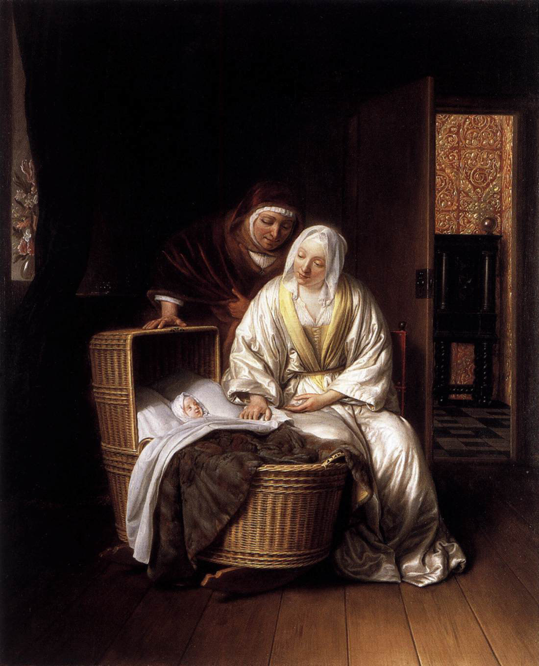 two women by a cradle